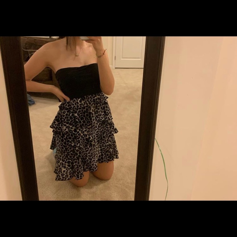 Super cute and fun black and animal print dress!